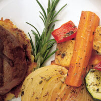 Grilled Beef Tenderloin served on a Bed of Curried Potato